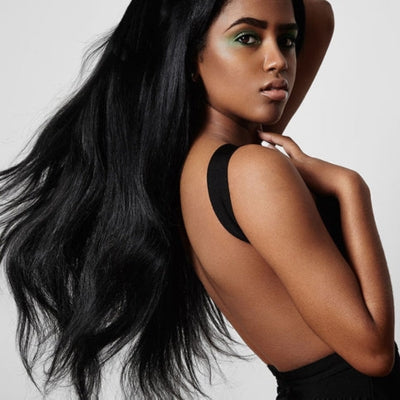 Model Wearing black 3 piece brazilian bundle hair